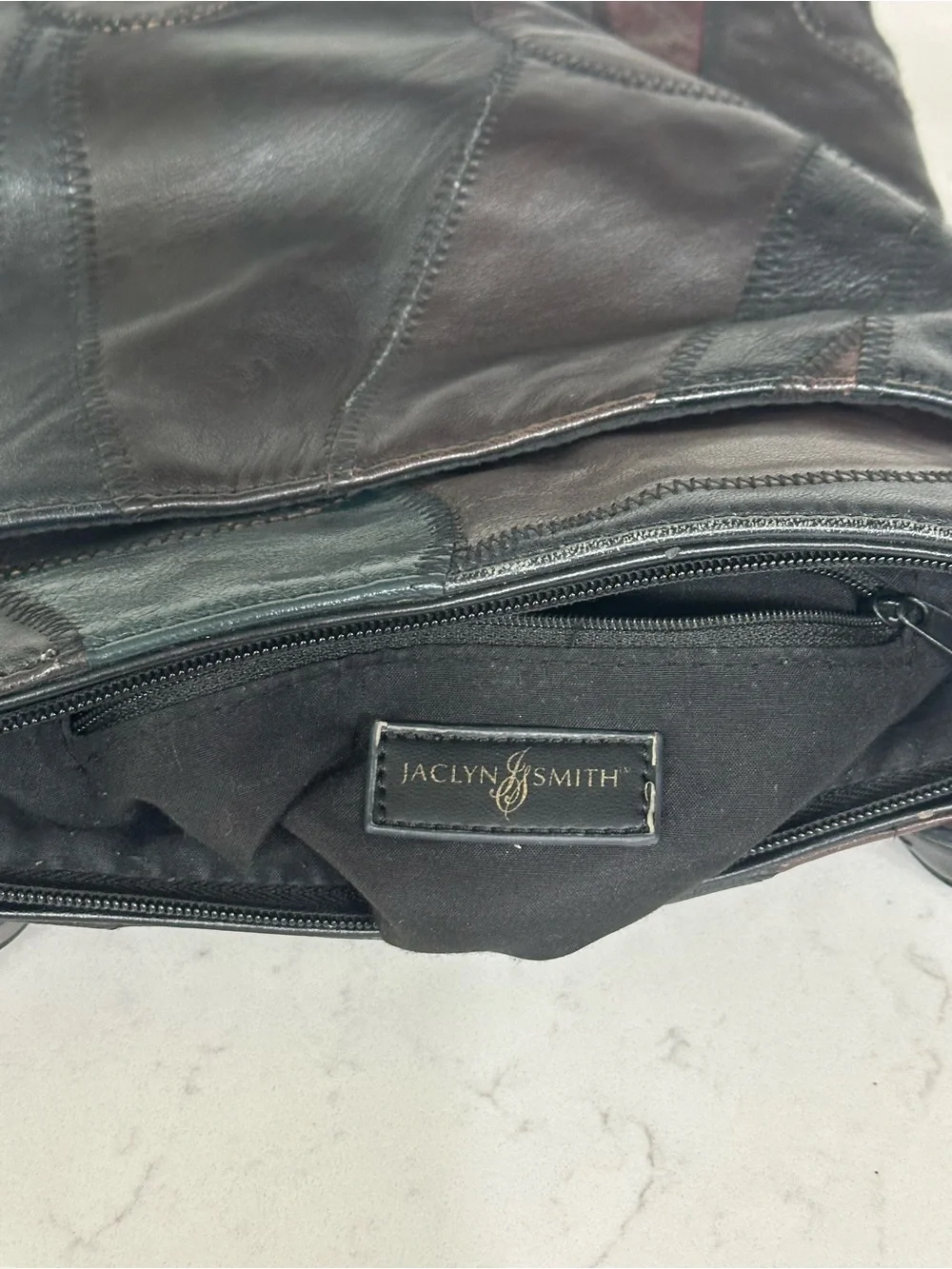 Jaclyn Smith Black Patchwork Leather Crossbody